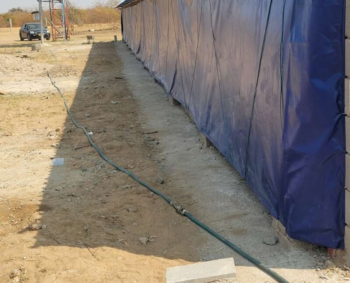 Roll-up livestock curtains for climate control