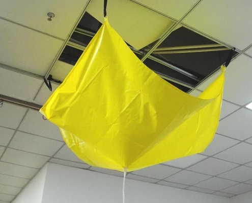 Leak diverter tarps with drainage hose Heavy-duty leak catcher for ceiling leaks